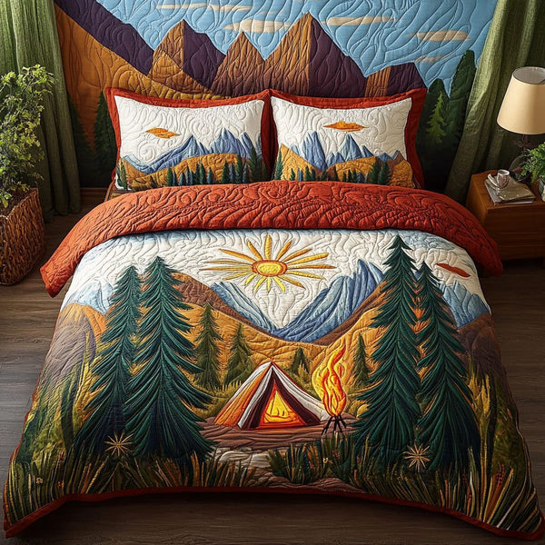 The Cozy Campsite quilted 3-piece bedding set on a made bed with two matching pillow shams