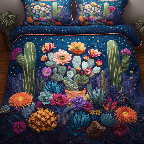 The Desert Garden quilted 3-piece bedding set on a made bed with two matching pillow shams