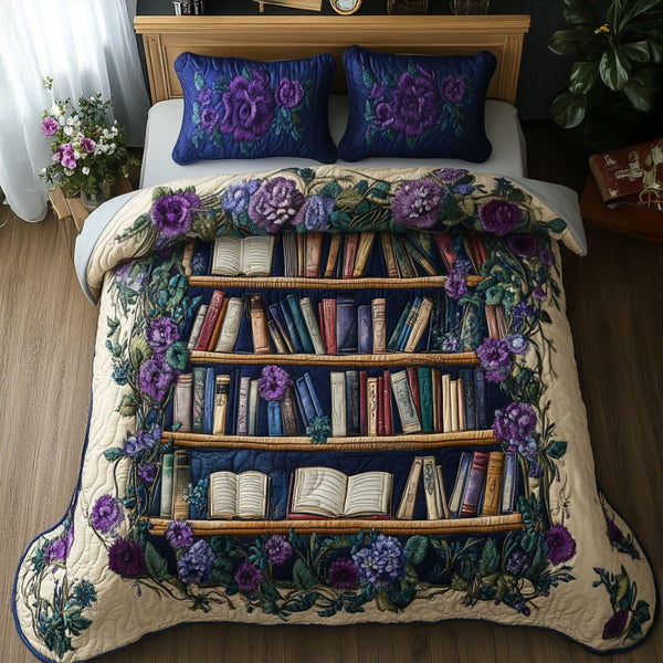 The Enchanted Library quilted 3-piece bedding set on a made bed with two matching pillow shams
