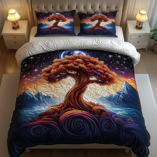 The Enchanted Tree quilted 3-piece bedding set on a made bed with two matching pillow shams