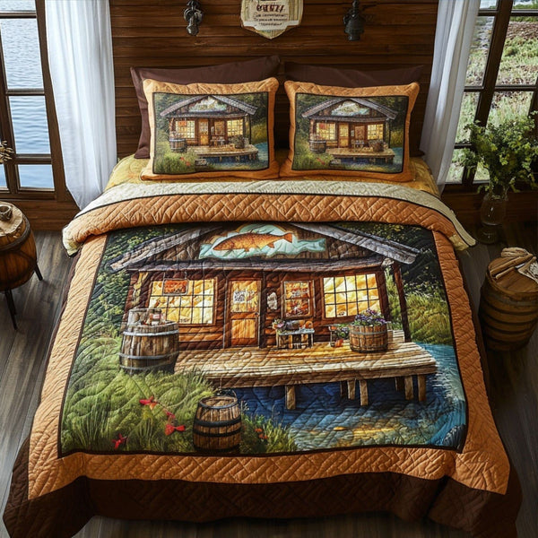 The Fishermans Lodge quilted 3-piece bedding set on a made bed with two matching pillow shams