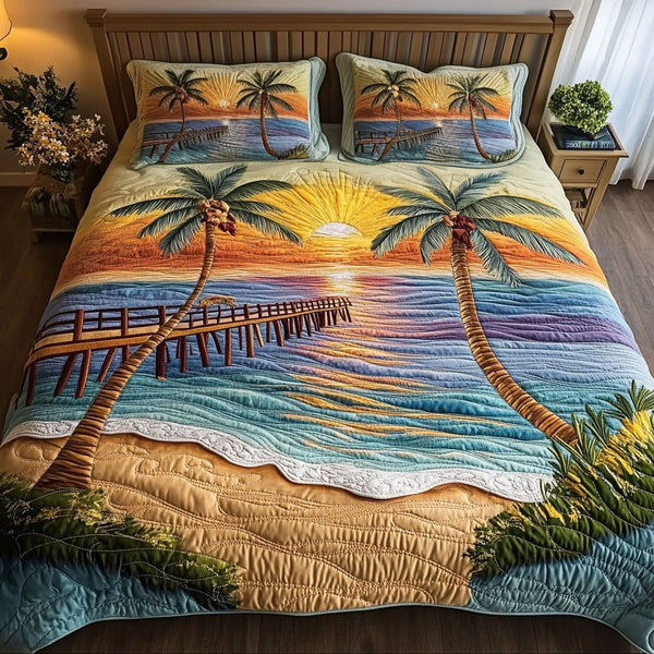 The Golden Pathway quilted 3-piece bedding set on a made bed with two matching pillow shams