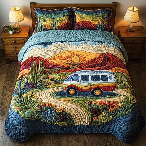 The Great Outdoors quilted 3-piece bedding set on a made bed with two matching pillow shams