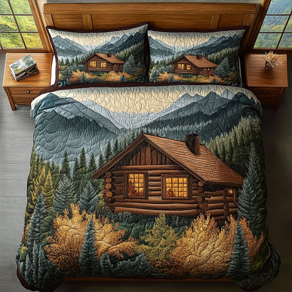 The Great Smoky Mountains Refuge quilted 3-piece bedding set on a made bed with two matching pillow shams