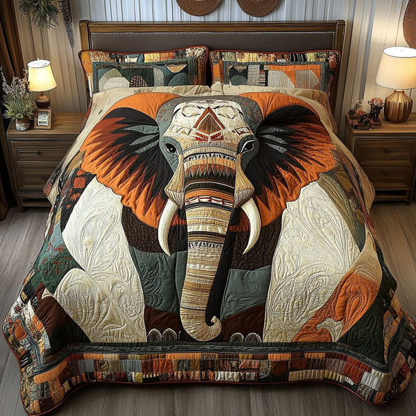 The Great Tusk quilted 3-piece bedding set on a made bed with two matching pillow shams