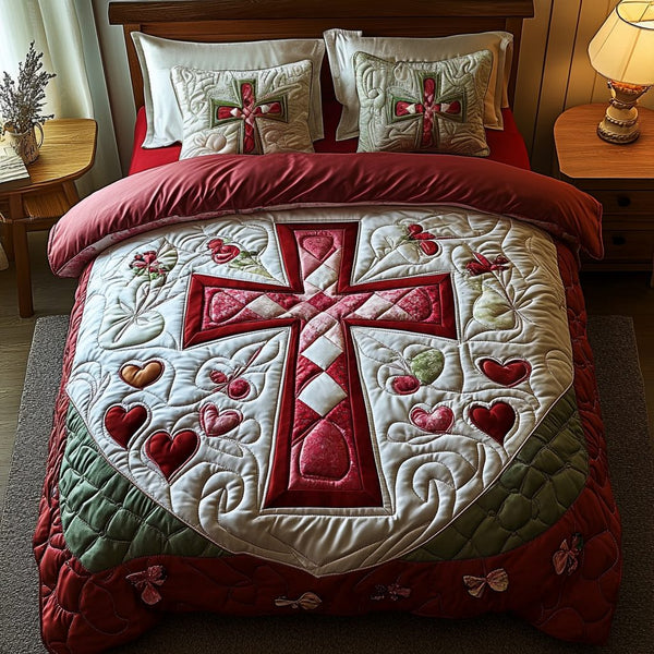The Heart Garden quilted 3-piece bedding set on a made bed with two matching pillow shams