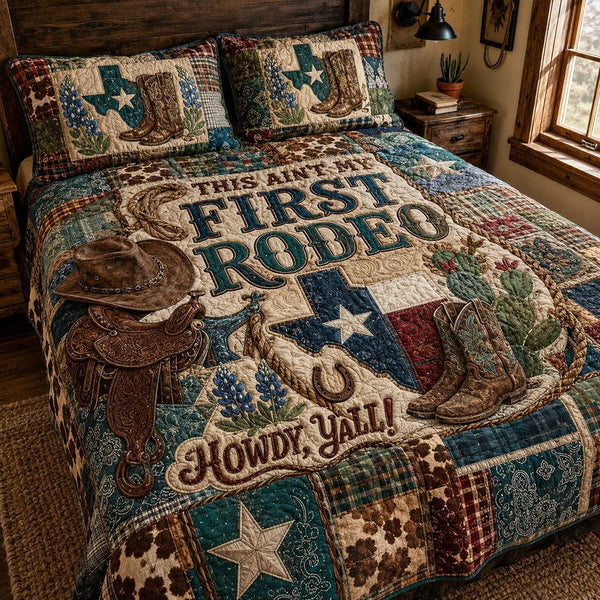 The Howdy Collection quilted 3-piece bedding set on a made bed with two matching pillow shams