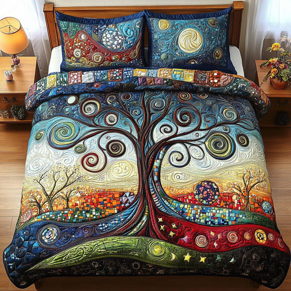 The Living Tree quilted 3-piece bedding set on a made bed with two matching pillow shams