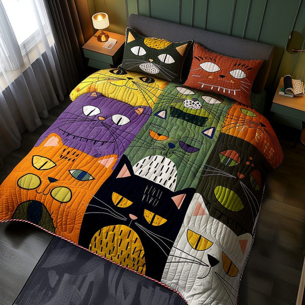The Meow Mosaic quilted 3-piece bedding set on a made bed with two matching pillow shams