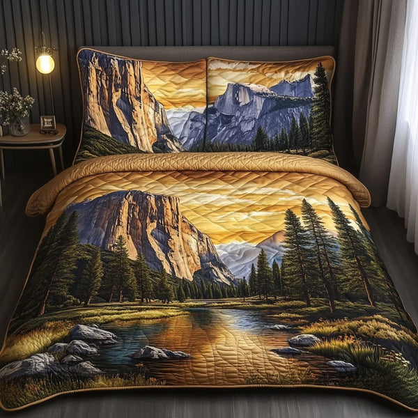 The Mighty El Capitan quilted 3-piece bedding set on a made bed with two matching pillow shams