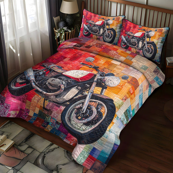 The Motorcycle Chase quilted 3-piece bedding set on a made bed with two matching pillow shams