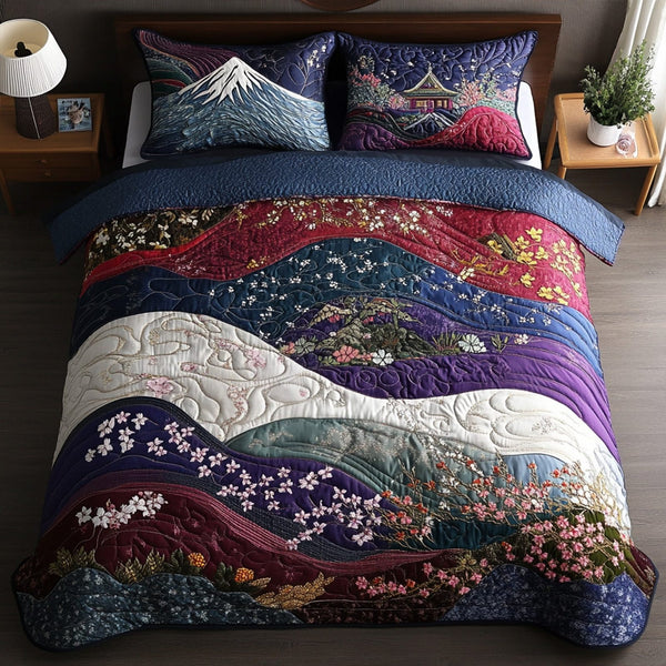 The Pagoda Garden quilted 3-piece bedding set on a made bed with two matching pillow shams