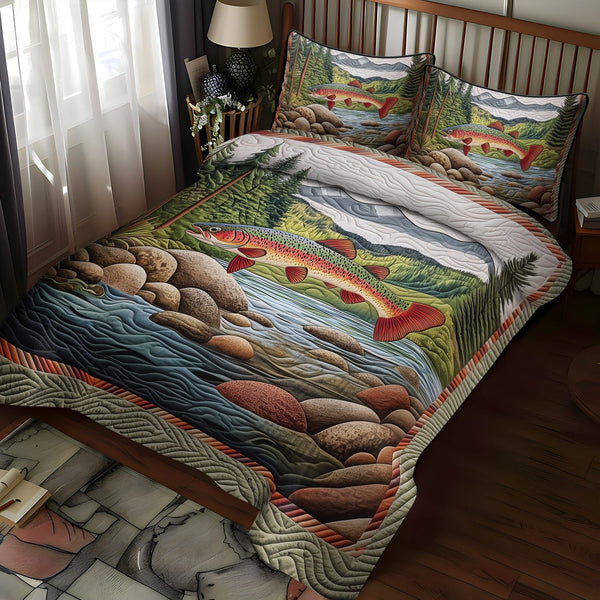 The River Run quilted 3-piece bedding set on a made bed with two matching pillow shams