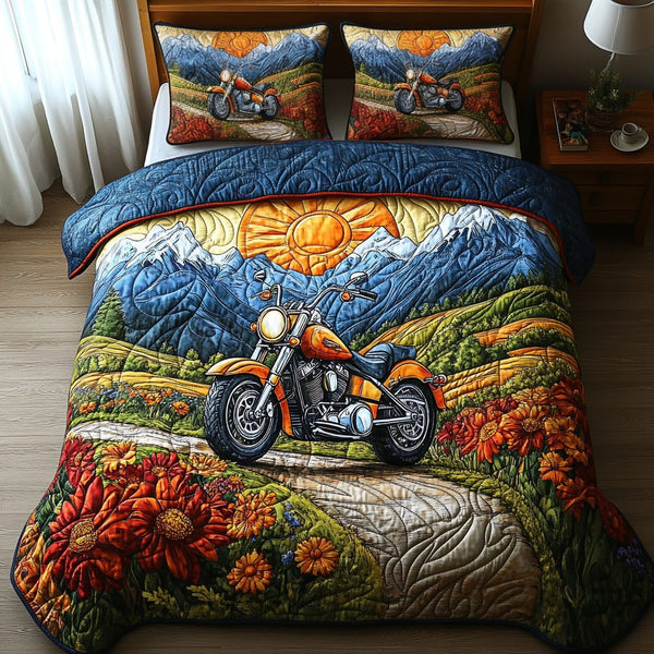 The Scenic Ride quilted 3-piece bedding set on a made bed with two matching pillow shams