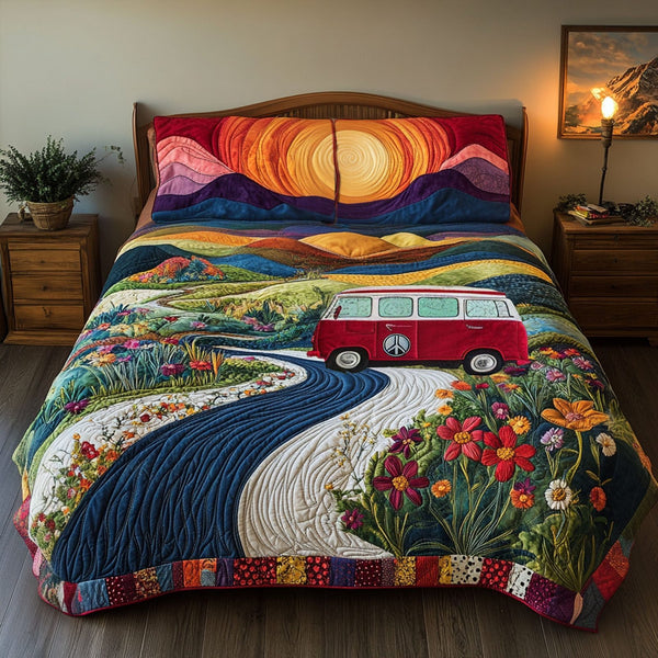 The Wildflower Route quilted 3-piece bedding set on a made bed with two matching pillow shams