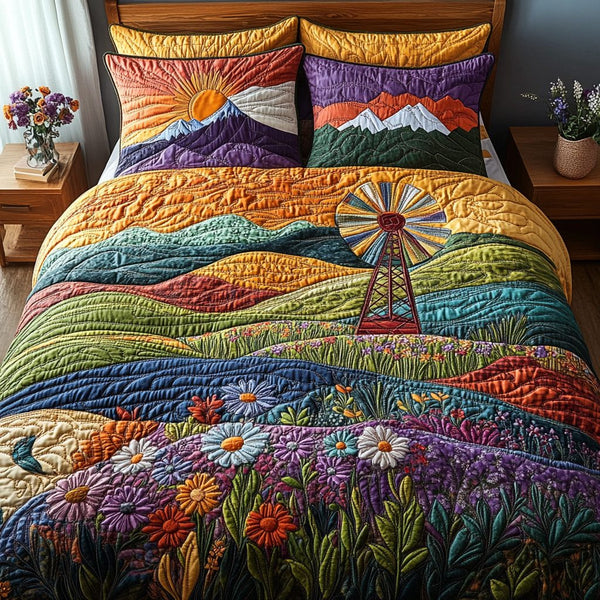 The Windmill Horizon quilted 3-piece bedding set on a made bed with two matching pillow shams
