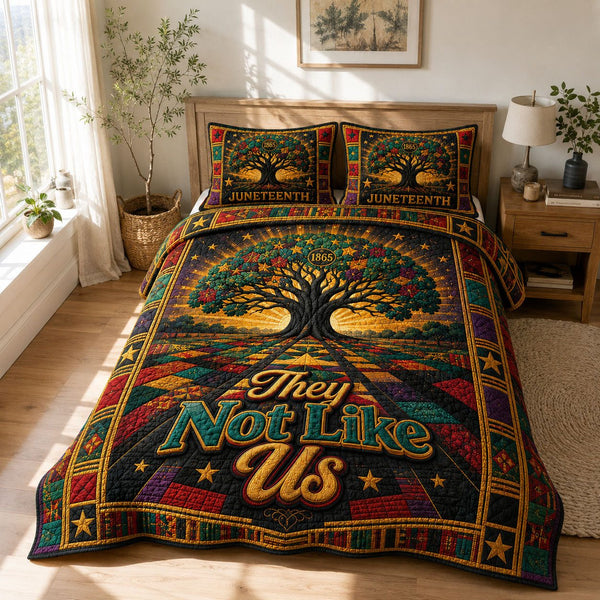 They Not Like Us Celebration Tree quilted 3-piece bedding set on a made bed with two matching pillow shams