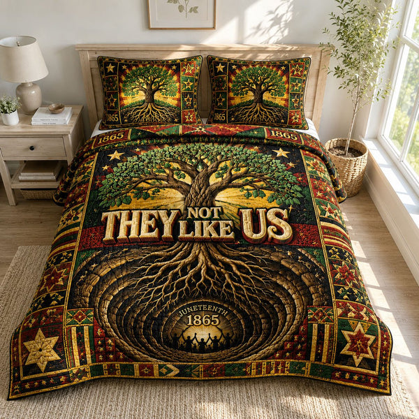 They Not Like Us Freedom Roots quilted 3-piece bedding set on a made bed in a warmly lit bedroom