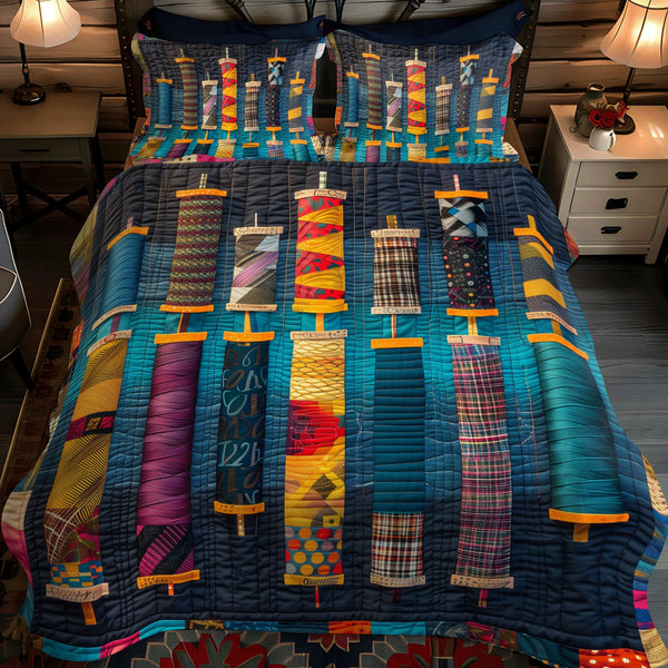 Threaded Harmony quilted 3-piece bedding set on a made bed with two matching pillow shams