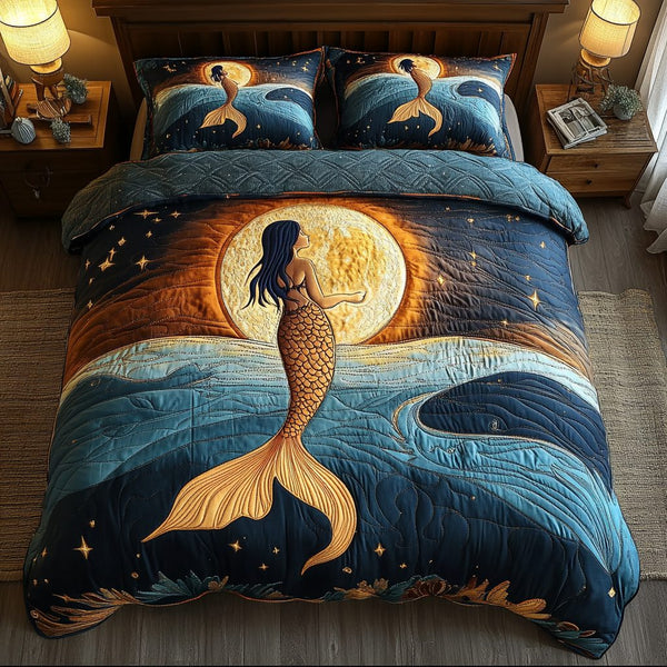 Tidal Beauty quilted 3-piece bedding set on a made bed with two matching pillow shams