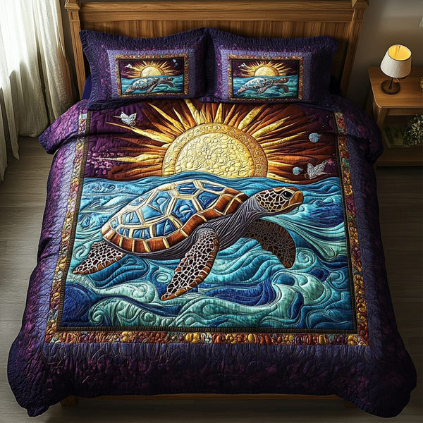 Tidal Bliss quilted 3-piece bedding set on a made bed with two matching pillow shams