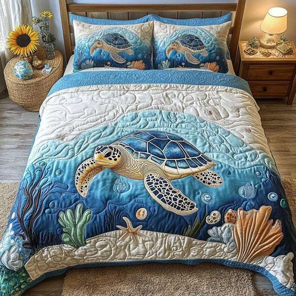 Tidal Calm quilted 3-piece bedding set on a made bed with two matching pillow shams