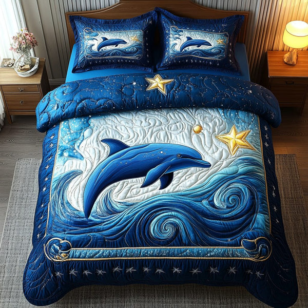Tidal Grace quilted 3-piece bedding set on a made bed with two matching pillow shams