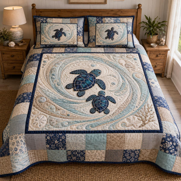 Tidal Harmony quilted 3-piece bedding set on a made bed with two matching pillow shams