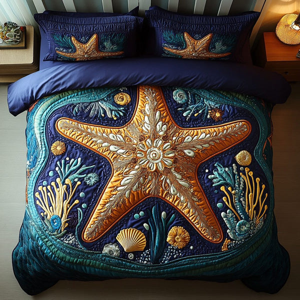 Tidal Harmony quilted 3-piece bedding set on a made bed with two matching pillow shams
