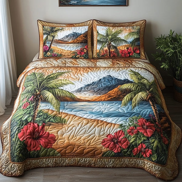 Tidal Tranquility quilted 3-piece bedding set on a made bed with two matching pillow shams