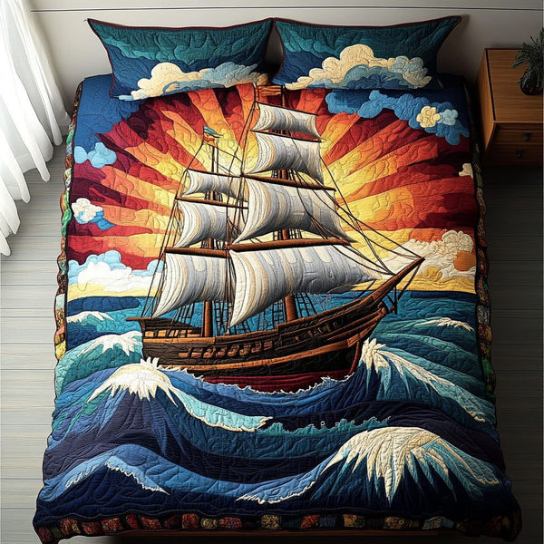 Tidal Tranquility quilted 3-piece bedding set on a made bed with two matching pillow shams