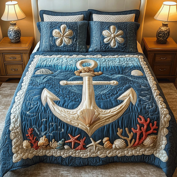 Tidal Tranquility quilted 3-piece bedding set on a made bed with two matching pillow shams