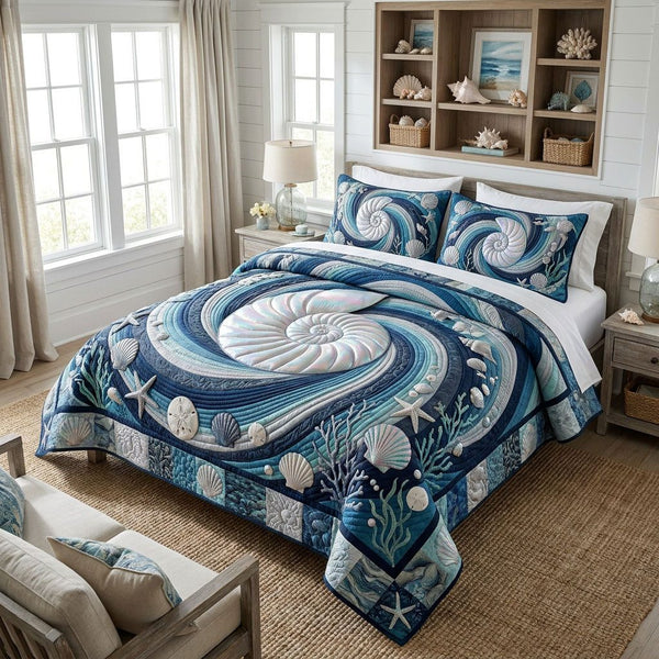 Tides of Wonder quilted 3-piece bedding set on a made bed with two matching pillow shams