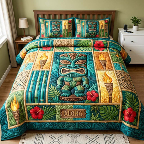 Tiki Aloha quilted 3-piece bedding set on a made bed with two matching pillow shams