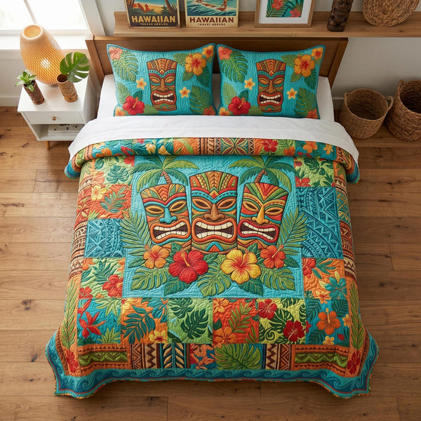 Tiki Essence quilted 3-piece bedding set on a made bed with two matching pillow shams