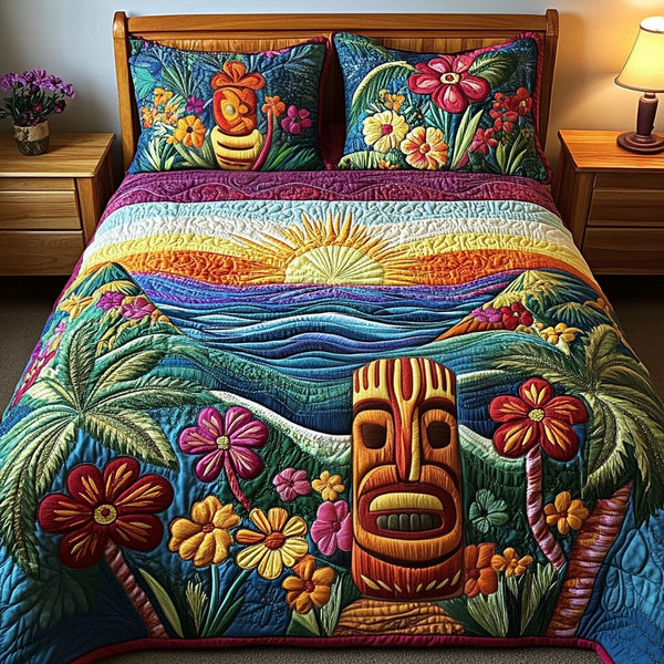 Tiki Spirit quilted 3-piece bedding set on a made bed with two matching pillow shams