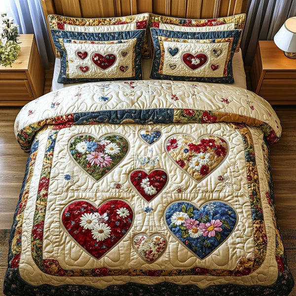 Timeless Hearts Bloom quilted 3-piece bedding set on a made bed in a farmhouse bedroom