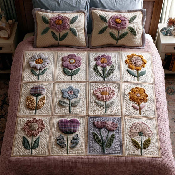 Tiny Blossoms quilted 3-piece bedding set on a made bed with two matching pillow shams
