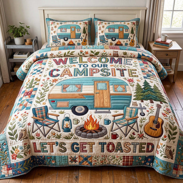 Toasted Campsite quilted 3-piece bedding set on a made bed with two matching pillow shams
