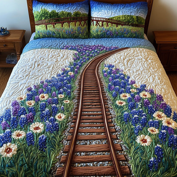 Tracks of Texas quilted 3-piece bedding set on a made bed in a rustic timber bedroom