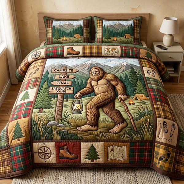 Trail Bigfoot quilted 3-piece bedding set on a made bed with two matching pillow shams