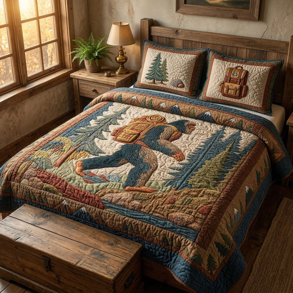 Trail Explorer quilted 3-piece bedding set on a made bed with two matching pillow shams