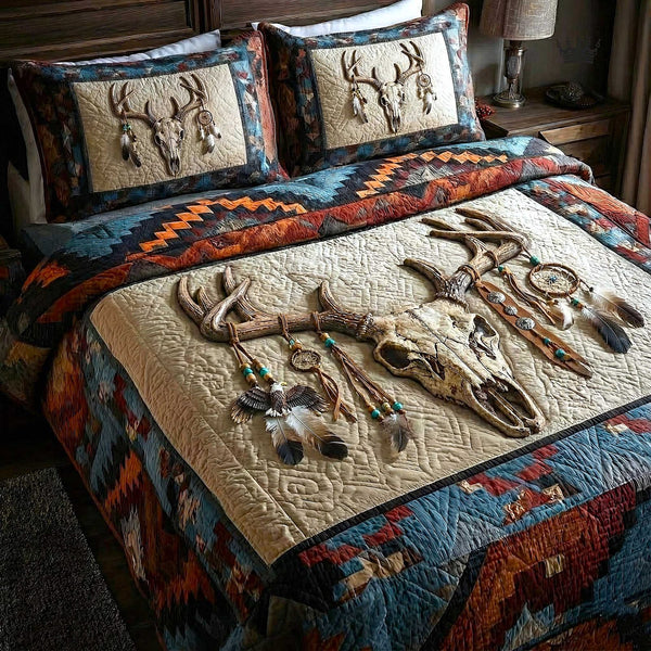 Trailblazer Spirit quilted 3-piece bedding set on a made bed with two matching pillow shams