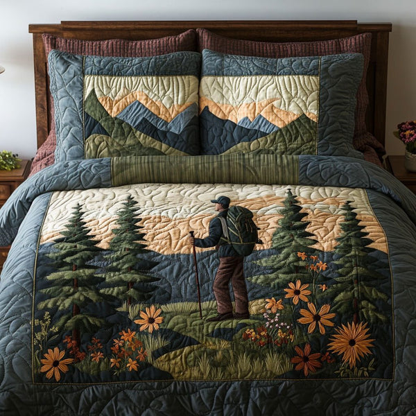Trailblazer Trek quilted 3-piece bedding set on a made bed with two matching pillow shams