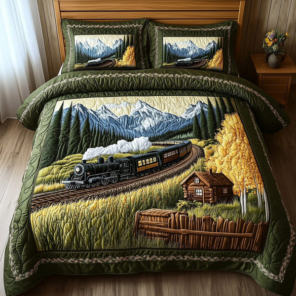 Train Forest Trails quilted 3-piece bedding set on a made bed with two matching pillow shams