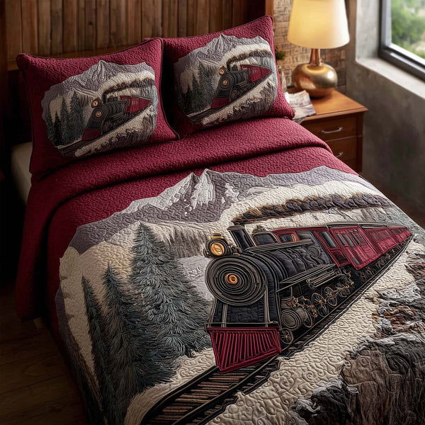 Train Journey quilted 3-piece bedding set on a made bed with two matching pillow shams