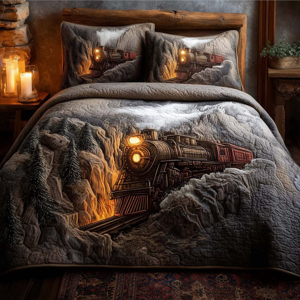 Train Journey quilted 3-piece bedding set on a made bed with two matching pillow shams