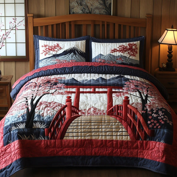 Tranquil Blossom View quilted 3-piece bedding set on a made bed with two matching pillow shams