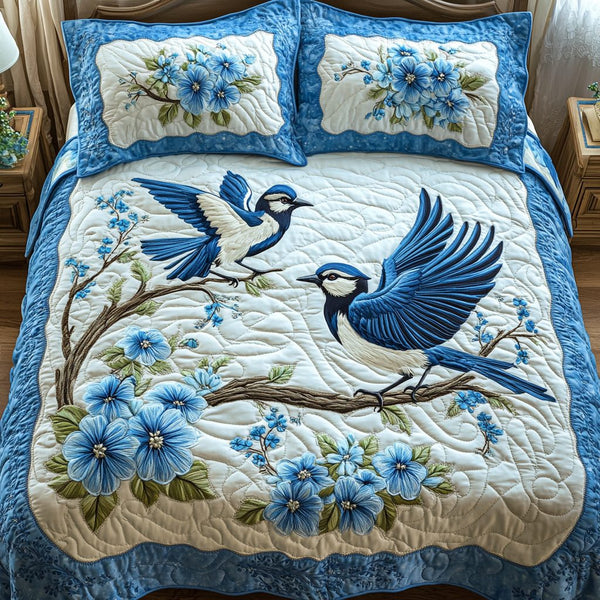Tranquil Branch quilted 3-piece bedding set on a made bed in a rustic timber bedroom