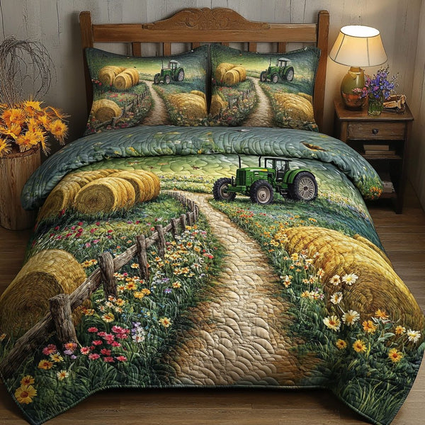 Tranquil Fields quilted 3-piece bedding set on a made bed with two matching pillow shams